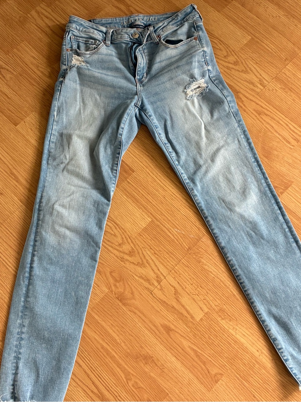 American Eagle Outfitters Light Wash Slim Jeans with Distressing